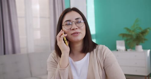 Smiling Business Woman in Glasses Talking Mobile Phone at Home Office Portrait of Joyful Girl Making