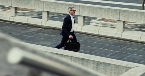 Man, briefcase and run for rushing in city with morning commute, hurry and late for appointment