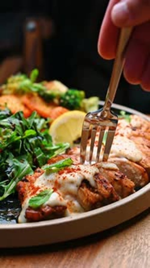 Delicious Grilled Chicken with Fresh Salad and Vegetables