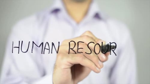 Writing Human Resources on Clear Surface