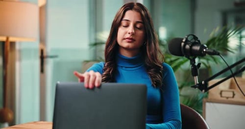 Happy, portrait and woman with mic in studio for podcast, broadcast and interview for talk show