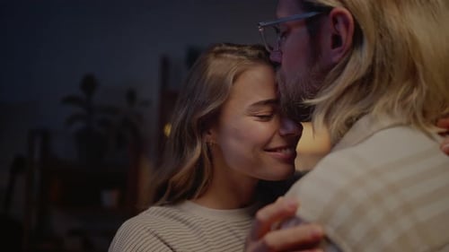 Loving Couple Embracing Each Other Affectionately Indoors