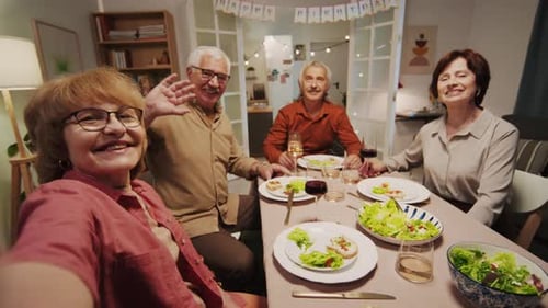Cheerful Seniors Celebrating a Birthday Together