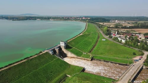 Aerial View of Water Dam Releasing Floodwater From Reservoir