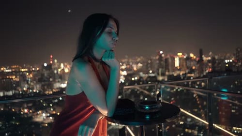 Impatient Woman Waiting for Someone and Checking Phone in Bar in Evening Adult