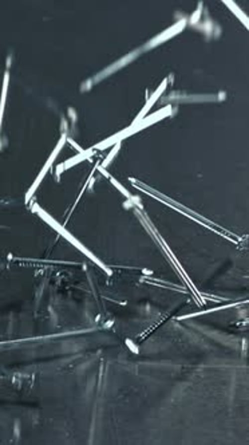 Nails Fall on a Metal Table Filmed on a Highspeed Camera at 1000 Fps