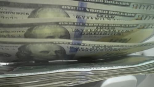 Money Counting Machine Counts Hundred Dollar Bills