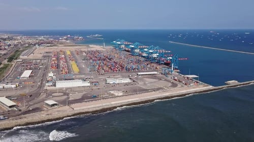 Aerial View of Busy Container Port on Coast