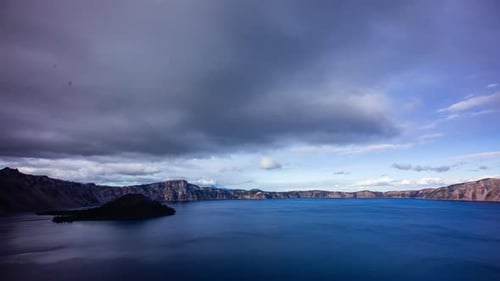 Time lapse - Beautiful Clouds over the mountain range in Crater Lake