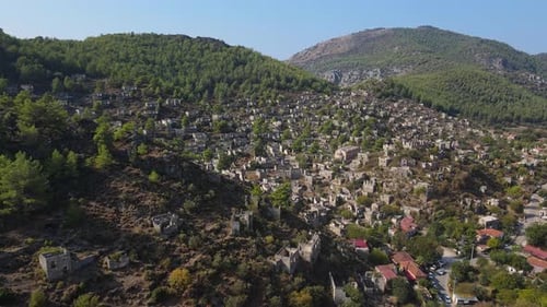 Aerial View a Mountain with an Abandoned Village in the Valley Below