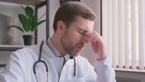 Close Up of a Man in Doctor's Coat
