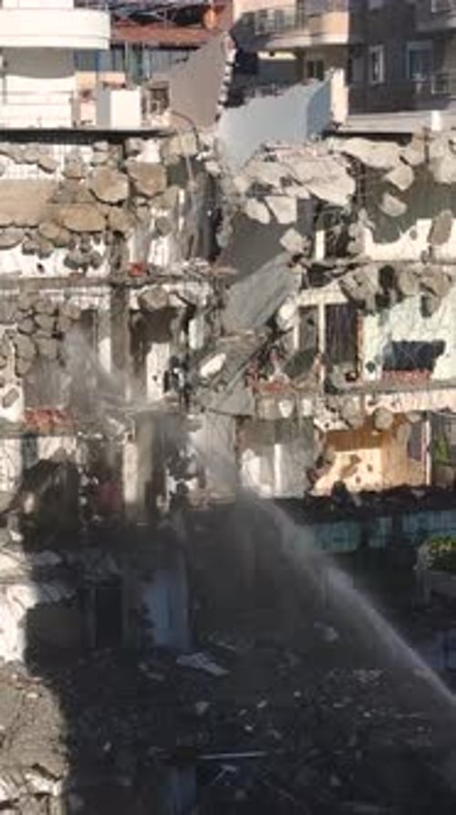 Demolished Building Ruins in Urban Setting Daytime