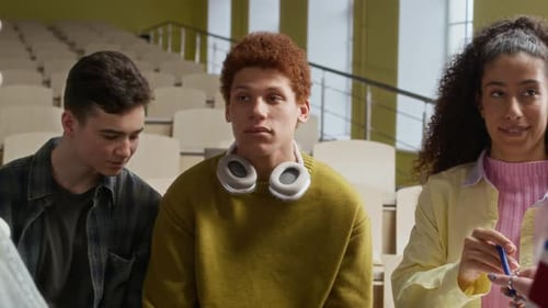 Gen Z Peers Chatting after Lecture in University