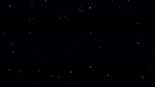 Fallende Schneeflocken in der Nacht
