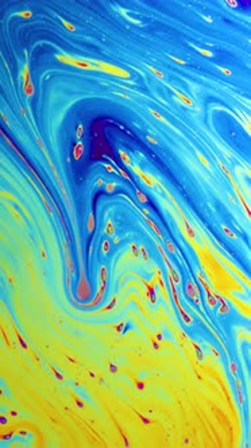 Macro soap bubble creates a colorful and psychedelic background