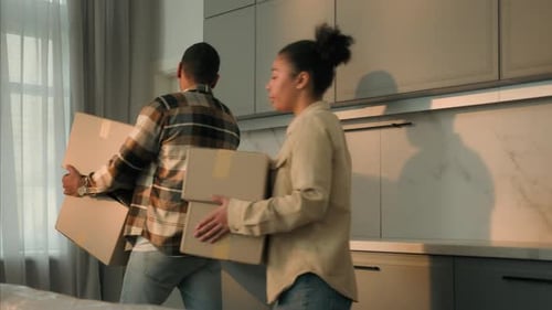 Frustrated Home Owners Renters African American Family Sad Couple Woman Man Pack Cardboard Boxes