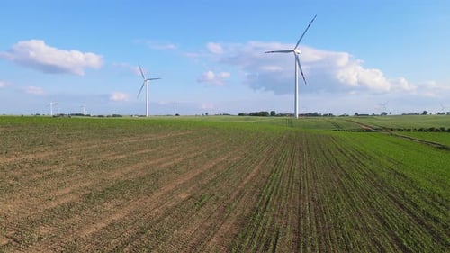 Wind Power Plant Produces Electrical Energy Scenic Windmill with Rotating Blades in Rural