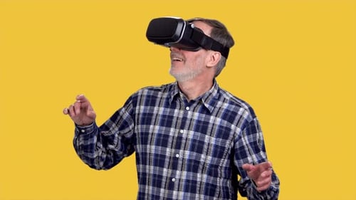 Mature Adult Exploring Virtual Reality with Headset