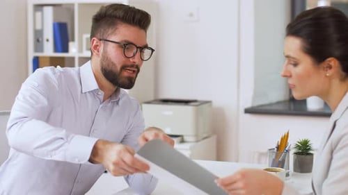 Business Meeting with Two Colleagues in Bright Office
