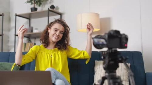 Woman Vlogging at Home on Couch