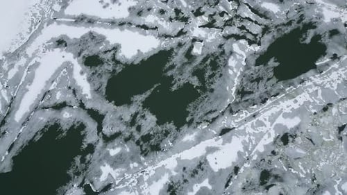 Aerial Frozen River And Lake In Winter Drone View Of Ice Covered Water