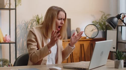 Businesswoman Works on Laptop Loses Becoming Surprised Sudden Lottery Results Bad News Fortune Loss