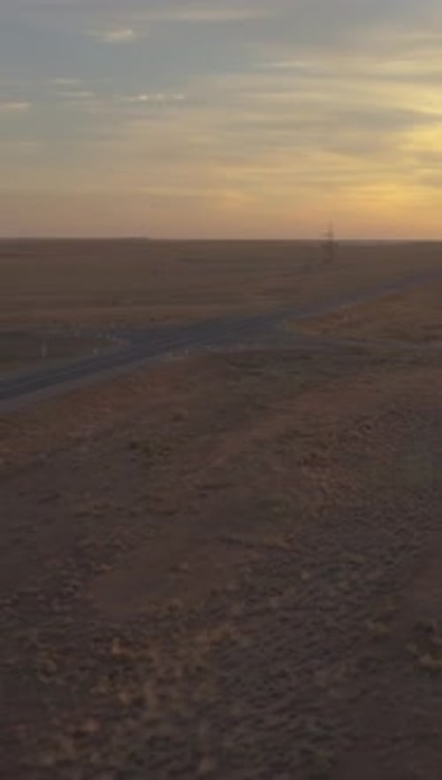 Truck is Going on Highway at Colorful Sunset Aerial View Vertical Video