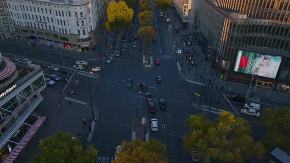 Fly Over Busy Road Intersection in Modern Urban Borough at Golden Hour ...