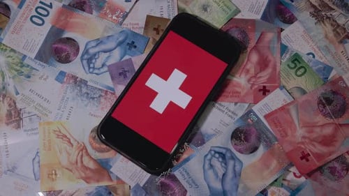 Different Swiss Francs And The National Flag