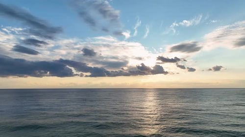 Beautiful View Sunset Over Sea Ocean Waves Crashing on Beach