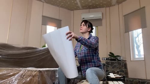 Woman DIY in home improvement