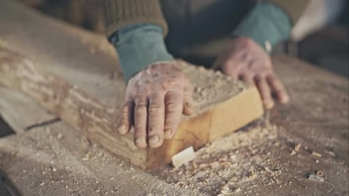 Hand of Old Masters on Board From Oak Sawdust