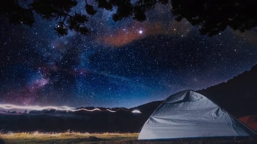 Camping in Tent on Nature at Travel Under Milky Way Stars at Night