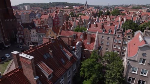 Drone Flight Across the Old Town Tiled Roofs in the Center of Gdansk Poland