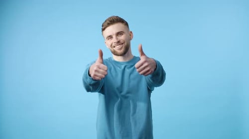 Enthusiastic Man Gives Double Thumbs Up