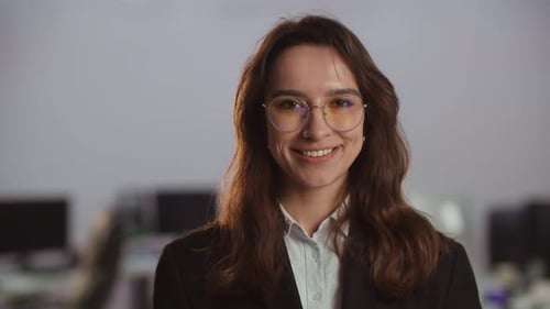 View of Smiling Businesswoman in Glasses and Business Suit Closeup Shot of a Business Lady in Front