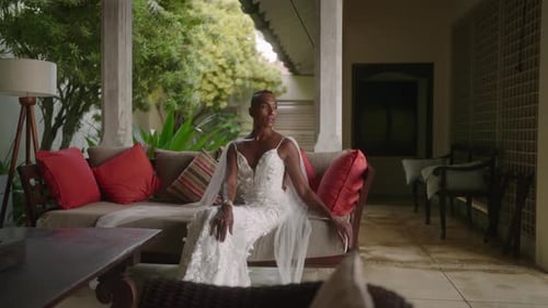 Stylish Woman in White Wedding Dress Poses