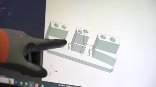 Computer Screen with a Model of Metal Piece