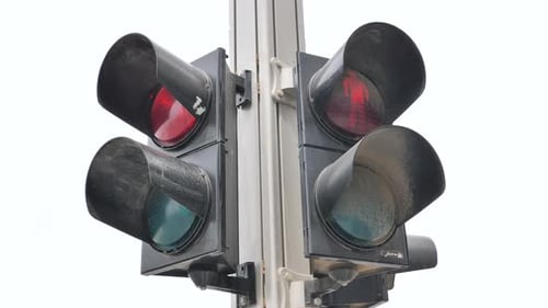 Close up on pedestrian street light changing from red to green