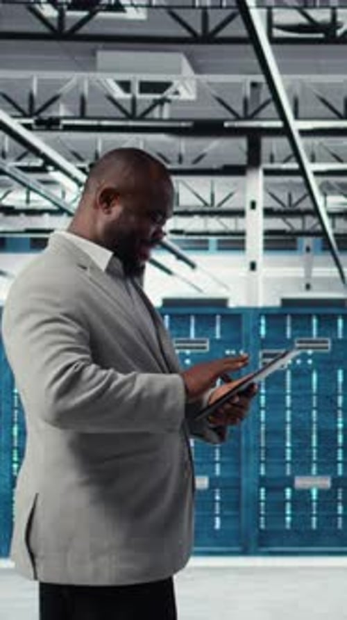 Vertical Video Programmer in Data Center Using Tablet to Manage Software Updates