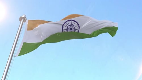 Realistic Waving Indian Flag Against Bright Blue Sky