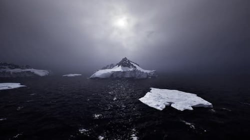 Arctic Region Showcasing Frosty Terrain and Heavy Overcast Cover