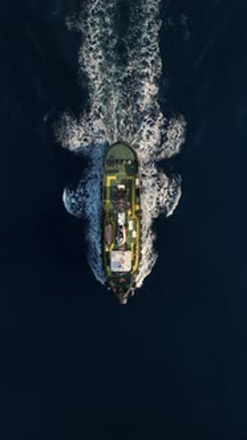 Vertical Video Maritime Return Tugboat Sailing to Base