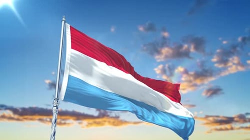 Realistic Waving Luxembourg Flag Against Blue Sky