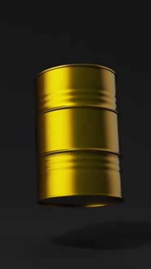 Single Gold Metal Oil Barrel Rotating on a Black Background for Petroleum Industry Concept Vertical