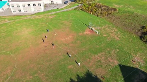 Drone Shot Of Young Athletes Practicing Soccer On Sunny Field In Halifax Canada
