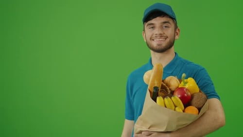 Green Screen Delivery Man Brings Paper Bag with Food