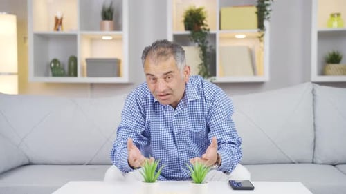 Man looking at camera confused.