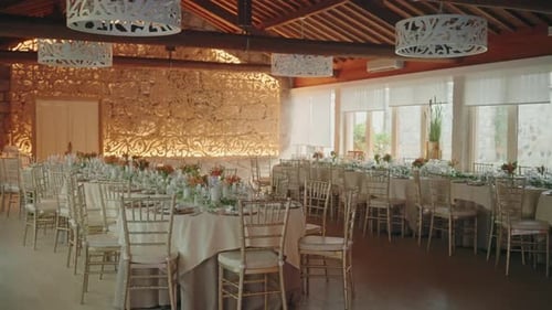 elegant wedding reception hall glowing with warm golden light
