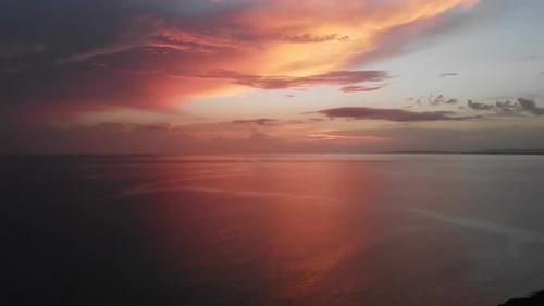 aerial shot of sunset with ocean